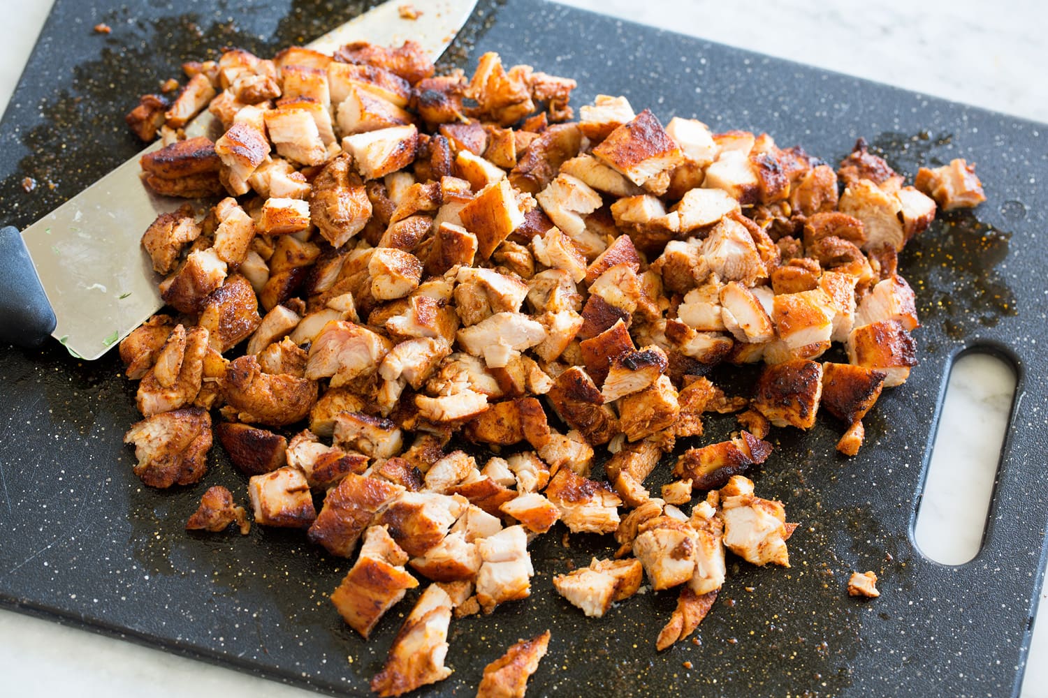 Chopping Mexican chicken.