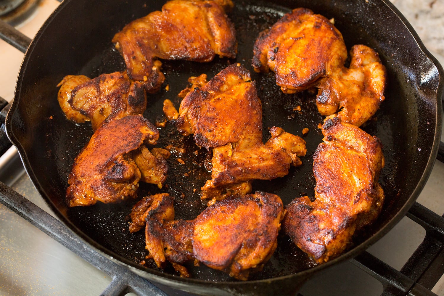 Pan searing chicken.
