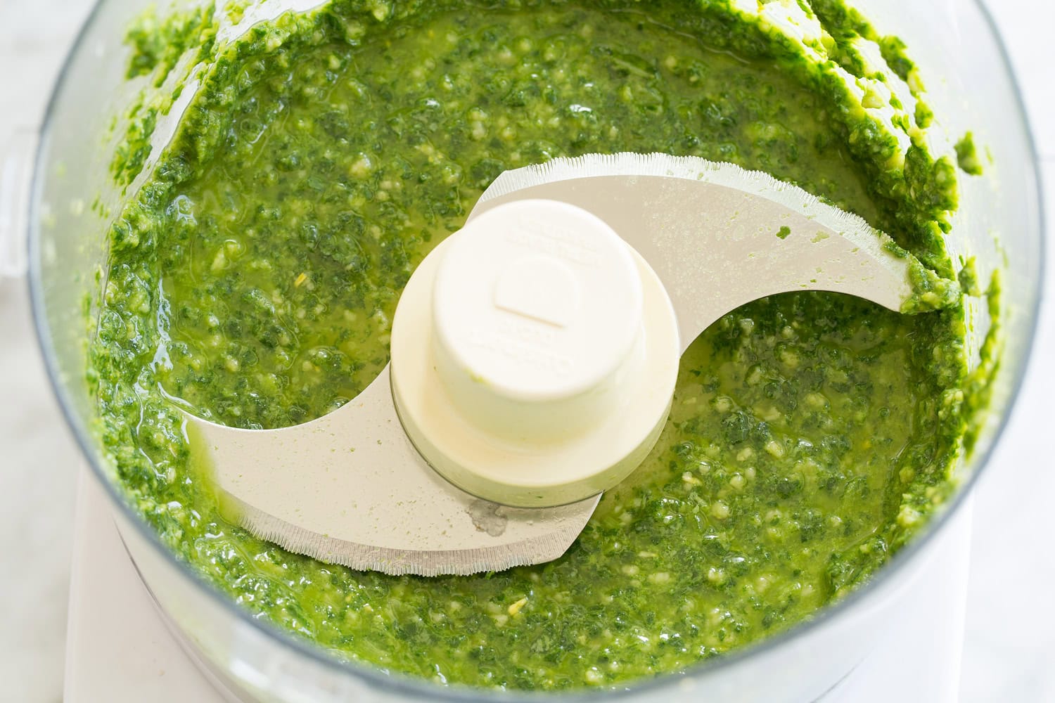 Homemade pesto in a food processor.